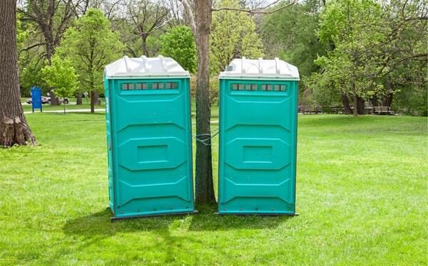 Portable restrooms set up for a corporate outdoor event